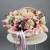 Композиция в корзине "Диодора" из французских роз Квиксенд, диантусов и кустовых пионовидных роз Бомбастик в Ивантеевке